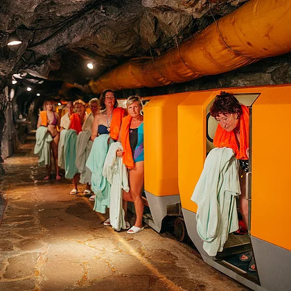 A patient with ankylosing spondylitis gets off the train at the Gastein Healing Gallery.